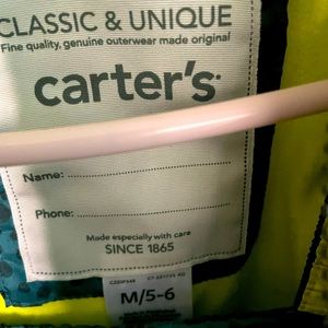 Cute dinosaur puffer jacket with good and matching snow suit. Only worn once.